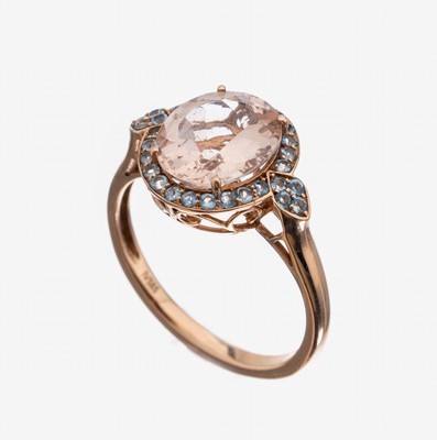 14 kt Gold Morganit-Topas-Ring, RG 585/000,mittig ein ovalfacett. Morganit ca. 5.0 ct, umgeben von 30 Blautopase (beh.) zus. ca. 0.18ct, RW 66, ca. ...