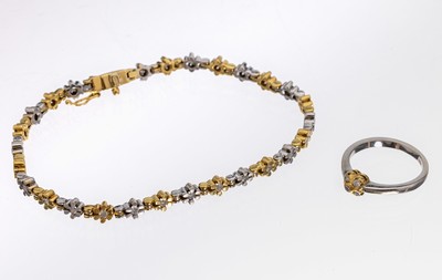 18 kt Gold Brillant-Schmuckset, GG/WG 750/000, best. aus: Armband L. ca. 19 cm, Kastenschloss mit Sicherheitsacht und Ring RW 52, blütenförm. ...