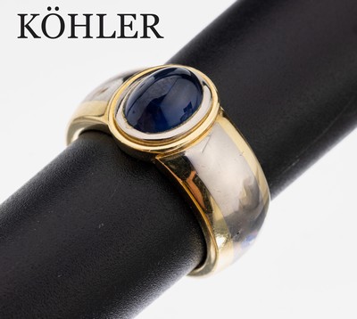 18 kt Gold Saphir-Ring, GG/WG 750/000, in WG gefasster ovaler Saphir-Cabochon ca. 3.11 ct, RW 57, ca. 14 g, Meistermarke KÖHLER/Schwäbisch Gmünd