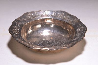 Silberschale, 20.Jh., 950er Silber, geschweifter Rand mit graviertem Blütendekor, D. 17,5cm, ca. 294g