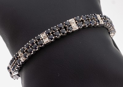 8 kt Gold Saphir-Brillant-Armband, WG 333/000, bes. mit 86 rundfacett. Saphiren zus.ca. 9.20 ct, 18 Brillanten zus. ca. 0.18 ct Weiß/si-p, L. ca. ...
