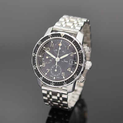 SINN Armbanduhr mit Chronograph, Schweiz/Deutschland um 1990, beids. vergl., Boden und Drücker verschr., neutr. Gliederband m. dopp. Faltschl., ...