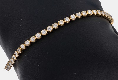 14 kt Gold Brillant-Armband, GG 585/000, 53Brillanten zus. ca. 3.47 ct (grav.) feines Weiß-l.get.Weiß/vs-p, L. ca. 18 cm, Kastenschloss mit 2 ...