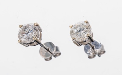 Paar 14 kt Gold Brillant-Ohrstecker, WG 585/000, 2 Brillanten zus. ca. 1.05 ct Weiß/p, ca. 1.2 g