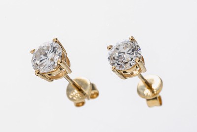 Paar 14 kt Gold Diamant-Ohrstecker, GG 585/000, 1 Brillant und 1 Altschliffdiamant zus. ca. 1.15 ct Weiß-l.get.Weiß/si-p