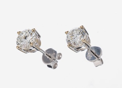 Paar 14 kt Gold Brillant-Ohrstecker, WG 585/000, 2 Brillanten zus. ca. 1.00 ct Weiß/vs-si
