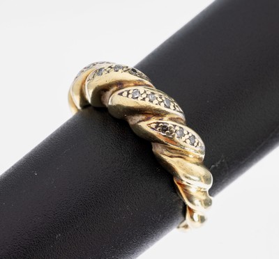 14 kt Gold Diamant-Ring, GG 585/000 gepr., 12 8/8-Diamanten zus. ca. 0.06 Weiß/si-p, gedrehte Form, ca. 5.7 g, RW 60