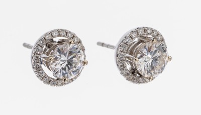 Paar 18 kt Gold Brillant-Ohrstecker, WG 750/000, 2 Brillanten, 1 x 0.81 ct 1 x 0.77 ct, zus. ca. 1.58 ct hochfeines Weiß(E)/lr, abnehmbare Kränze ...