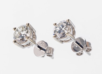 Paar 14 kt Gold Brillant-Ohrstecker, WG 585/000, 2 Brillanten zus. ca. 1.01 ct feines Weiß-Weiß/vs-si