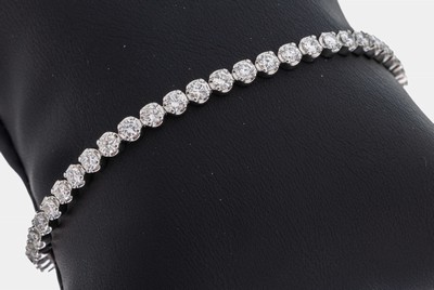 14 kt Gold Brillant-Linienarmband, WG 585/000, 47 Brillanten zus. ca. 4.55 ct (grav.) feines Weiß-Weiß/vs-p, L. ca. 18.3 cm,Kastenschloss mit 2 ...