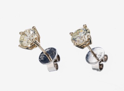 Paar 14 kt Gold Brillant-Ohrstecker, WG 585/000, 2 Brillanten zus. ca. 2.04 ct get. Weiß/vs-si, ca. 2.0 g