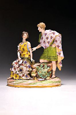 Porzellangruppe, wohl Rudolstadt,, um 1900, antikes Paar, polychrom, bemalt, Fehlstelle dem Felsen, l. best., ca. 27 x 23 x 11.5 cm