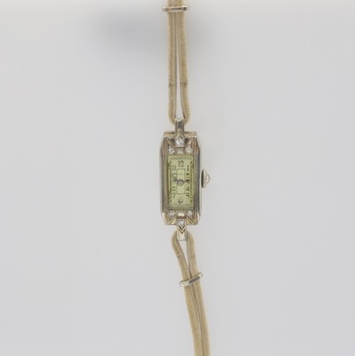 MARVIN Art-Déco Damenarmbanduhr in WG 750/000, Schweiz um 1925, Handaufzug, rechteckig. Scharniergeh. m. Schlaufen- Anstößen, Front m. ...