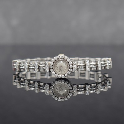 Jaeger-LeCoultre ausgefallene, Diamantbesetzte Damenarmbanduhr in WG 750/000, Schweiz um 1945, Handaufzug, 2-fach verschr. Geh. m. rückseitiger ...
