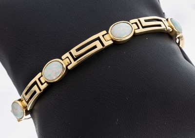 14 kt Gold Farbstein-Armband, GG 585/000, 7ovale synth. Opale, Mäandermuster, L. ca. 19 cm, Kastenschloss mit Sicherheitsacht sollte nachgearbeitet ...