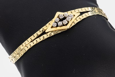 14 kt Gold Diamant-Armband, GG/WG 585/000, rautenf. Mittelteil mit 8 kl. in WG gefassten 8/8-Diamanten, L. ca. 18 cm, Kastenschloss ...