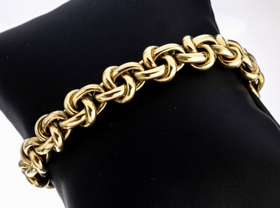 14 kt Gold Armband, GG 585/000, Österreich/Wien, ineinander verschlungene Glieder, L. ca.19.5 cm, Kastenschloss mit Sicherheitsacht, ca. 23.7 g