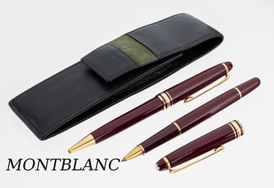 MONTBLANC Set, Meisterstückserie, 2 Kugelschreiber, Korpus roter Edelharz, Monturen Metall verg., mit Lederetui (nicht orig.)