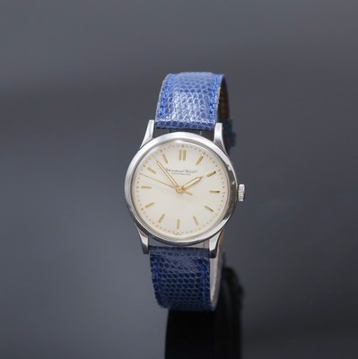 IWC Armbanduhr mit Kaliber 89 in Stahl, Schweiz um 1950, Handaufzug, Boden verschr., silb. Zifferbl. m. gold. Std.-Ind., Leuchtzeiger, sign. Werk m. ...