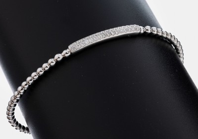 18 kt Gold Brillant-Armband, WG 750/000, Kugel-Glieder, flexibel gearbeitet, 32 Brillant zus. ca. 0.47 ct Weiß/si, D. ca. 6.5 cm, ca. 8.7 g
