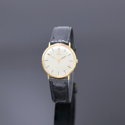 OMEGA Herrenarmbanduhr in GG 750/000 Referenz 131016, Schweiz um 1965, Handaufzug, 2-tlg. Geh., Lünette aufgedr., silb. Zifferbl. pat., gold. ...