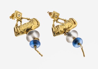 Paar 18 kt Gold Brillant-Ohrstecker, GG 750/000 gepr., außergewöhnliche Gestaltung, länglich bewegl., 2 Brillanten zus. ca. 0.06 ct Weiß/si, ...