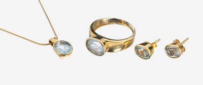 14 kt Gold Blautopas Schmuckset, GG 585/000, best. aus: Ring, ovalfacett. Blautopas (beh.) ca. 2.80 ct, RW 60; Anhänger, ovalfacett. Blautopas ...