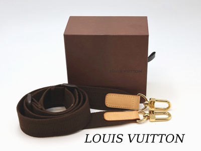 LOUIS VUITTON Tragegurt, brauner Stoff, Rindslederabschluss, Monturen Metall verg., L.verstellbar, in orig. Box, sehr guter EHZ