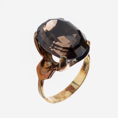 14 kt Gold Rauchquarz-Ring, GG 585/000, hoher Ringkopf mit einem ovalfacett. Rauchquarz, RW 58, ca. 8.2 g, Meistermarke unged.