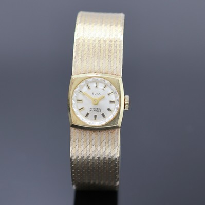 EUFA Damenarmbanduhr in GG 585/000, Schweiz um 1975, Handaufzug, 2-tlg. Geh. m. anges. Milanaiseband, Boden aufgedr., silb. Zifferbl., gold. Indizes ...