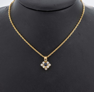 18 kt Gold Saphir-Brillant-Anhänger, GG 750/000, 7 Brillanten zus. ca. 0.50 ct Weiß/vs-si, mittig rundfacett. Saphir ca. 0.40 ct, an 14 kt GG ...