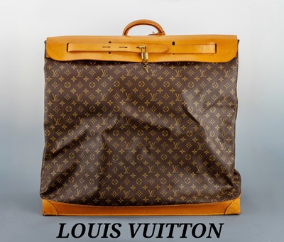 LOUIS VUITTON Steamer Bag 65, Monogram Canvas, Tragegriff, Gurt, Boden und Adressanhänger aus naturfarb. Leder, Schloss und Schlüssel anbei, innen ...