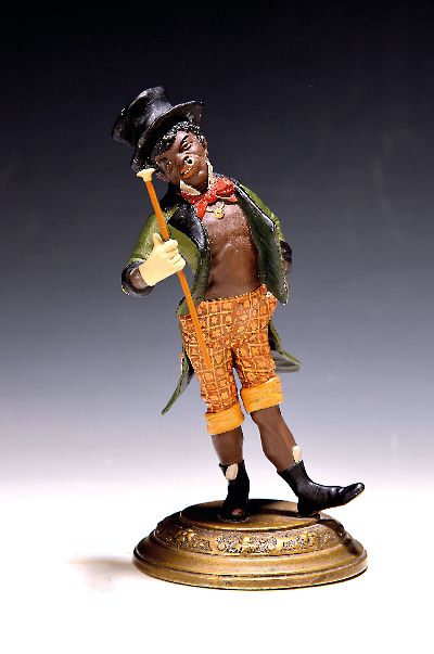 Nähgarnständer, deutsch, um 1880/1900, eleganter Clochard mit Stock und Zigarre, Fassung/Bemalung erneuert, Metall, Altersspuren, H. 20.5 cm