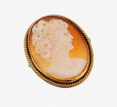 18 kt Gold Kamee-Brosche, GG 750/000, ovaleMuschelkamee, Darstellung einer Dame im Profil, Fassung mit Kordelverzierungen, ca. 3.4 x 2.8 cm, auch ...