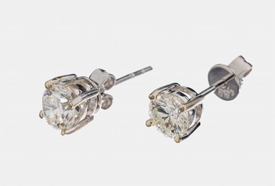 Paar 14 kt Gold Brillant-Ohrstecker, WG 585/000, 2 Brillanten zus. ca. 1.02 ct l.get.Weiß/vs-si