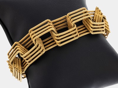 Massives 18 kt Gold Armband, GG 750/000, Glieder aus 4-rhg. Kordeldraht, L. ca. 23 cm, Kastenschloss mit Sicherheitsacht, ca. 94.8 g
