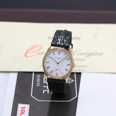 PATEK PHILIPPE Armbanduhr Serie Calatrava in GG 750/000 Referenz 3796 D, Handaufzug, Boden aufgedr., orig. Lederband m. orig. GG 750/000 Dornschl., ...