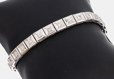 18 kt Gold Brillant-Armband, WG 750/000, 26Brillanten zus. ca. 3.00 ct Weiß-l.get.Weiß/ vs-si, L. ca. 18 cm, Kastenschloss mit Sicherheitsbügel, ...