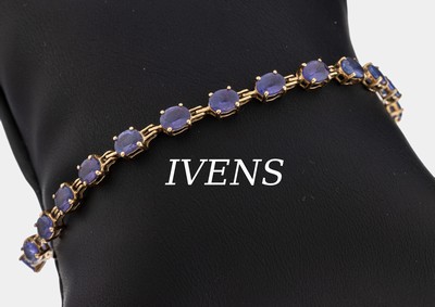 14 kt Gold IVENS Tansanit Armband, GG 585/ 000, 22 ovalfacett. Tansanite zus. ca. 6.50 ct(1 Stein fehlt), L. ca. 19 cm, Kastenschloß mit 2 ...
