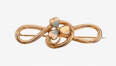 14 kt Gold Jugendstil-Opal-Brosche, GG 585/000, verschlungenes Motiv mit aufgelegter Blüte, diese mit kleinen Opalen ausgefaßt, stilrein, L. ca. ...