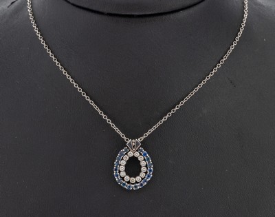 14 kt Gold Saphir-Brillant-Collier, WG 585/000, 18 rundfacett. Saphire zus. ca. 0.30 ct, 13 Brillanten zus. ca. 0.38 ct Weiß/p, L. ca. 44 cm, ...
