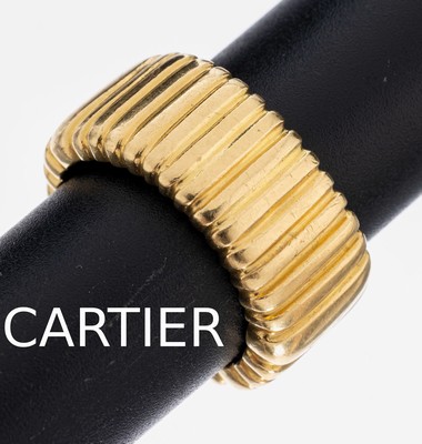18 kt Gold CARTIER Ring, GG 750/000, mehrfach gerillt, im Verlauf, RW 60, ca. 17.8 g, sign. und num., dat. 1992, im orig. Etui