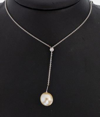 18 kt Gold Y-collier, GG 750/000, 1 barocke Südseezuchtperle Durchm. ca. 11.8 mmlight yellow, 1 Brillant ca. 0.05 ct Weiß/si, L gesamt ca. 52 cm
