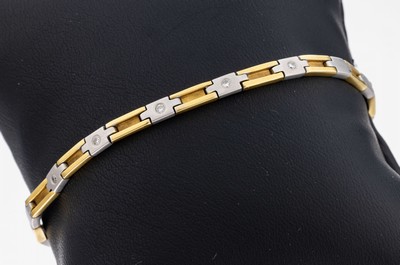 18 kt Gold Brillant-Armband, GG/WG 750/000 sat., 5 Brillanten zus. ca. 0.10 ct Weiß/si, L. ca. 19 cm, Kastenschloss mit Sicherheitsacht, ca. 13.5 g
