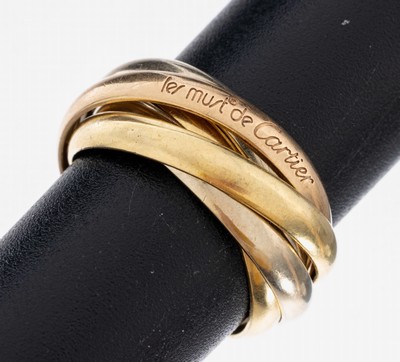 18 kt Gold MUST DE CARTIER Trinity Ring, GG/WG/RG 750/000, 5 in ineinander verschlungene Ringe, sign., RW 50, ca. 8.5 g, mit Etui, Umkarton und ...