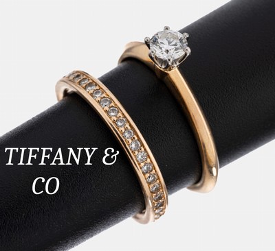 18 kt Gold TIFFANY & CO Brillant-Ring, RoseG 750/000 und Platin, in Platin gefasster Brillant ca. 0.26 ct (grav.) feines Weiß/vs, sign. und num., ...