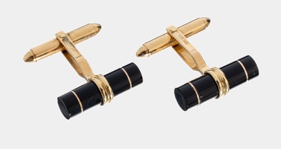 Paar 14 kt Gold Onyx-Manschettenknöpfe, GG 585/000, Onyx in Tonnenform mit kl. Goldring, H. ca. 2 cm, ca. 7.7 g
