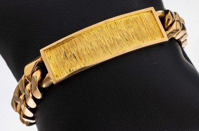 18 kt Gold Identitätsarmband, GG 750/000, Gravurplatte frei, strukt., L. ca. 22 cm, verdeckte Schließe mit Sicherheitsacht, ca. 88.6 g