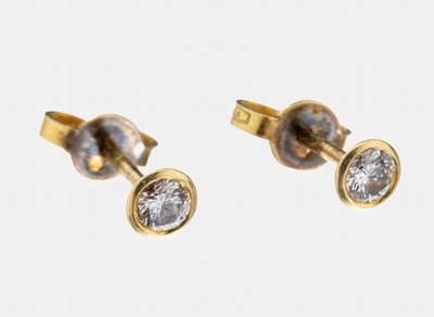 Paar 18 kt Gold Brillant-Ohrstecker, GG 585/000, 2 Brillanten zus. ca. 0.30 ct Weiß/si, ca. 1.2 g