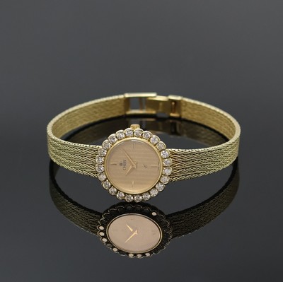 CHRIST Damenarmbanduhr in GG 585/000 mit Diamanten, Schweiz um 1975, quarz, Goldband, Boden aufgedr., Lünette aufw. m. Diamanten bes., goldfarb. ...